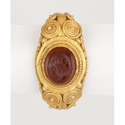 A Romano-British Finger-Ring with Filigree Wire Decoration and Carnelian Military Intaglio